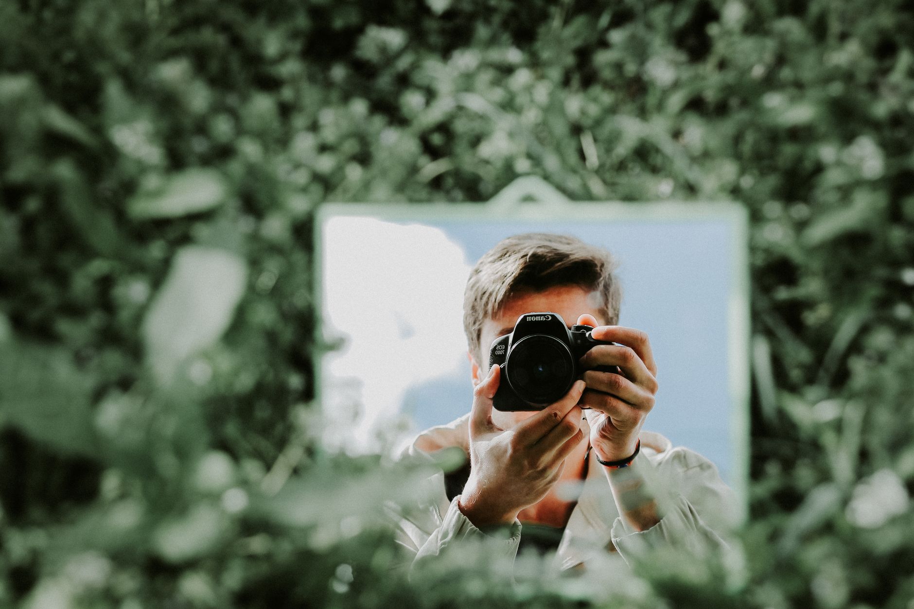Photographer framing natural landscape